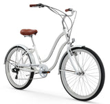 White Firmstrong Siren Women's 7-Speed Beach Cruiser at a 45-degree angle, showing the forward pedaling design and classic white fenders